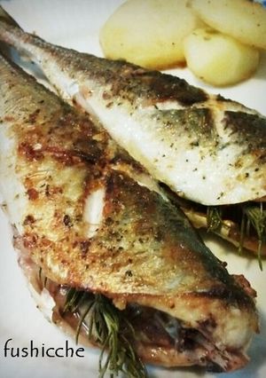 A picture of Grilled Horse Mackerel with Rosemary and Garlic.