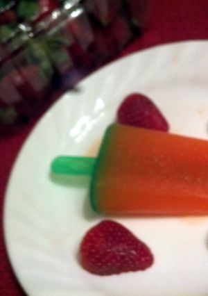A picture of Strawberry Kiwi Popsicles.