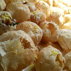 A picture of Cheese pani puri.