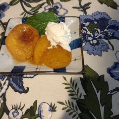 A picture of Apricots baked with brown sugar cinnamon butter sauce.