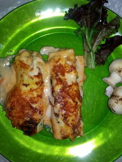 Una foto de Canelones de espinacas, gambas y pescado