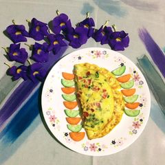 A picture of Chicken stuffed Omelette.
