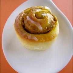 A picture of Halloween Pumpkin Cinnamon Roll.