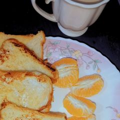 Tea,Toast and tangerines 😊 A picture of Tea,Toast and tangerines 😊.