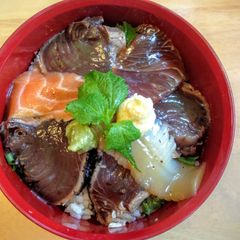A picture of Marinated Sashimi on Rice.
