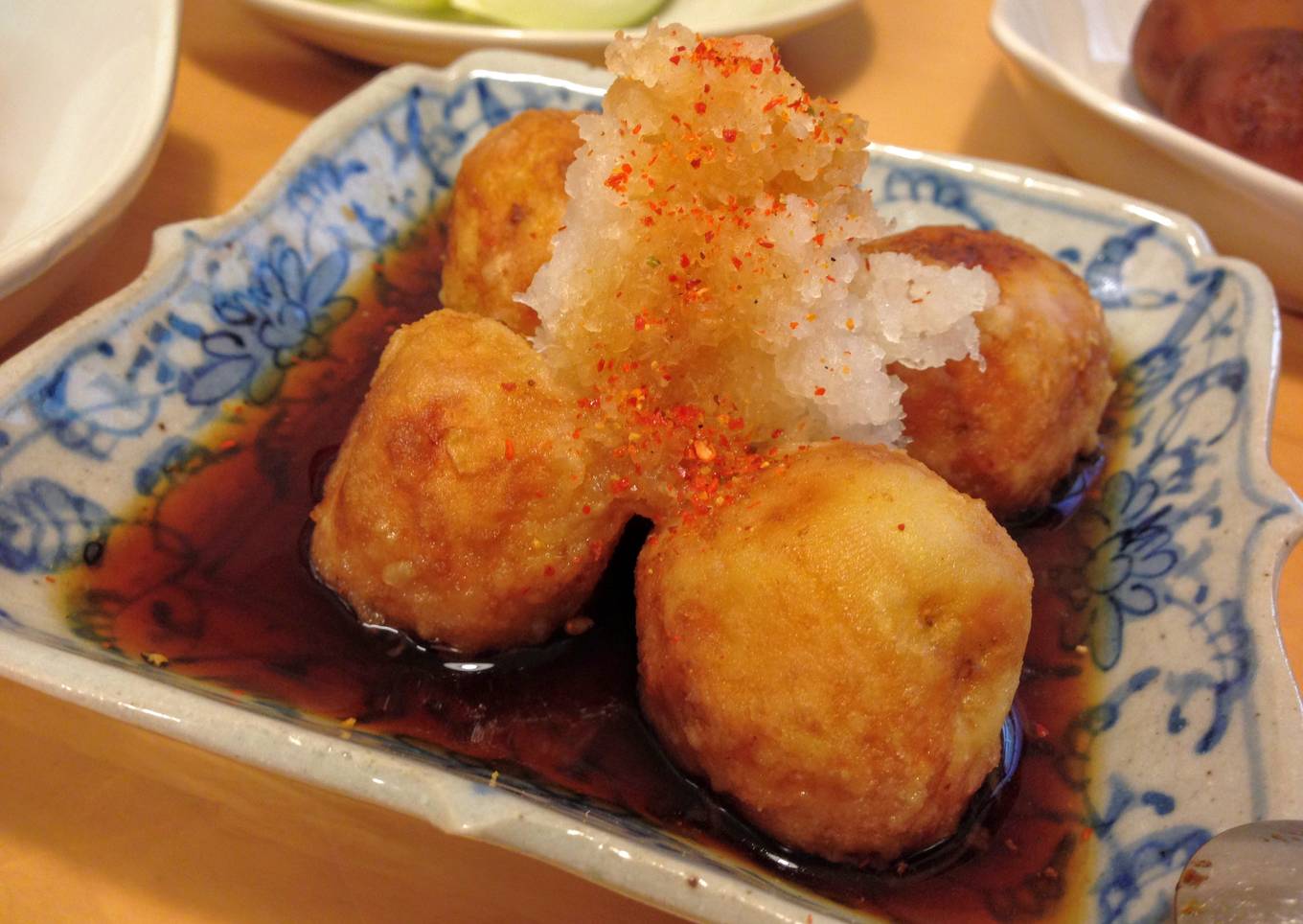 Boiled potato with grated garnish