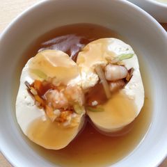 A picture of Rolled Tofu with Broth.