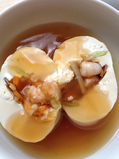 A picture of Rolled Tofu with Broth.
