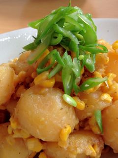 A picture of Potatoes & Corn with Butter & Soy Sauce.
