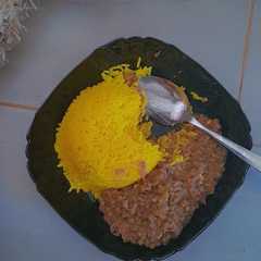 A picture of Yellow Rice with Lentil Stew.