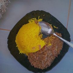 A picture of Yellow Rice with Lentil Stew.