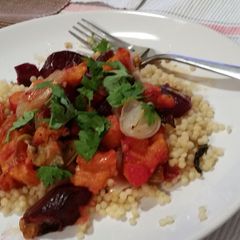 A picture of Roasted sweet Autumn vegetables with couscous.