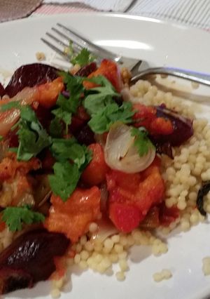 A picture of Roasted sweet Autumn vegetables with couscous.