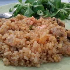 A picture of Seafood Paella with Brown Rice.