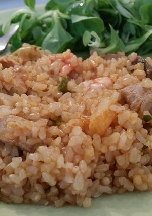 A picture of Seafood Paella with Brown Rice.