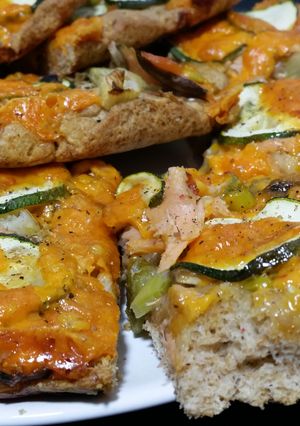 A picture of Whole-wheat Pizza with Smoked Salmon, Courgette and Chillies.