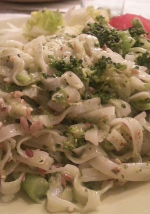 A picture of Pasta with home-made pesto and broccoli.