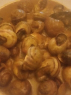 Una foto de Caracoles en salsa estilo de mi suegra