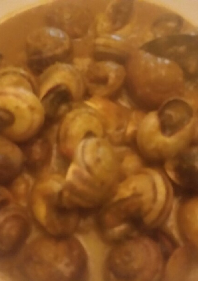Una foto de Caracoles en salsa estilo de mi suegra