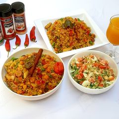 A picture of Sausage and shredded chicken fried rice.