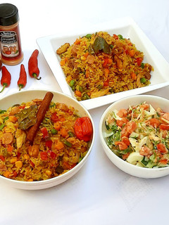 A picture of Sausage and shredded chicken fried rice.