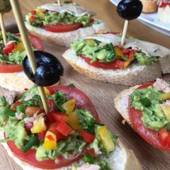 A picture of Avocado & Vine Ripened Tomato Crostini (small bites).