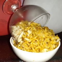 A picture of Glass Cheesy maggi.