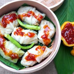 A picture of Steamed & Stuffed Cabbage Wraps.