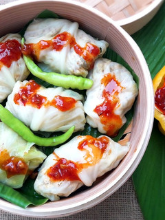 A picture of Steamed & Stuffed Cabbage Wraps.