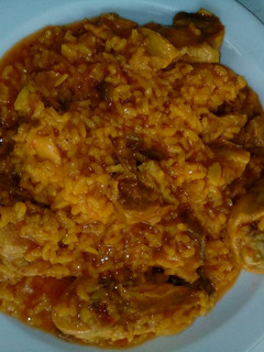 Una foto de Arroz meloso con pollo y costillas