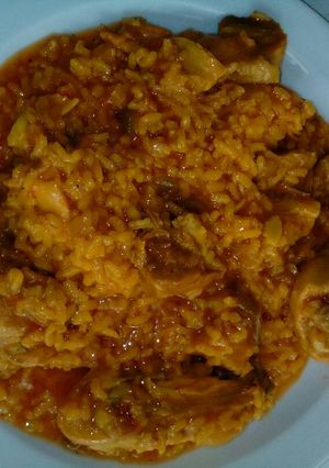 Una foto de Arroz meloso con pollo y costillas