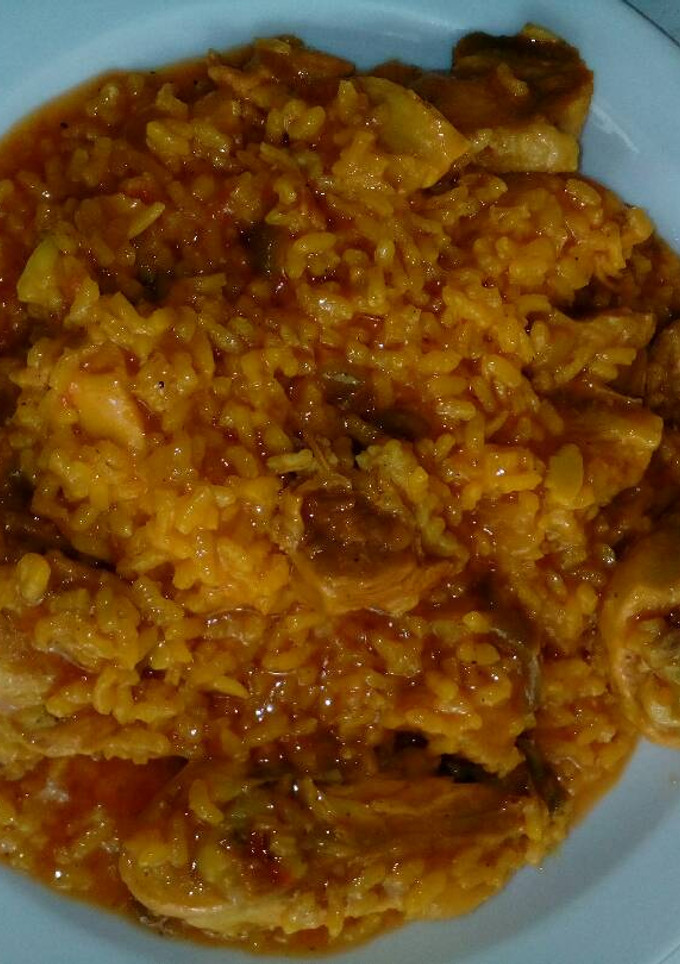 Una foto de Arroz meloso con pollo y costillas