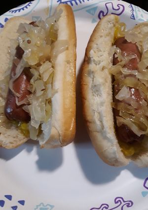 A picture of Homemade Fermented Sauerkraut on Hotdogs.