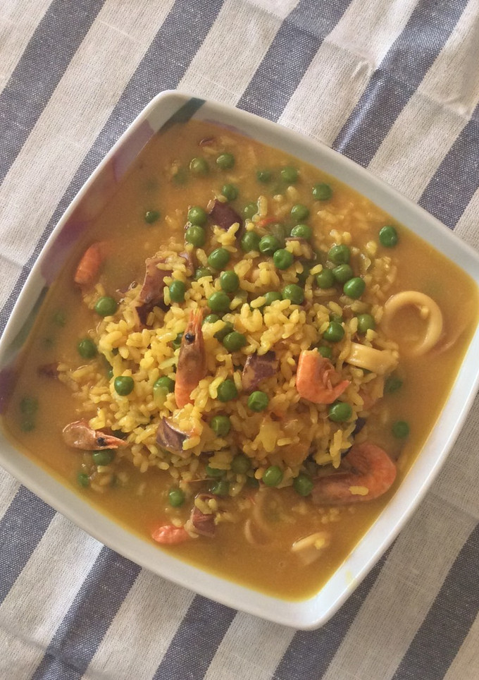 Una foto de Arroz caldoso de pescado con truco