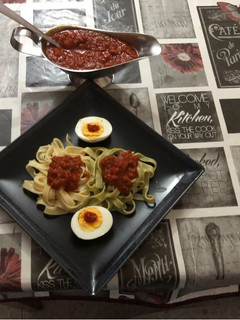 Una foto de Tagliatelles a la boloñesa