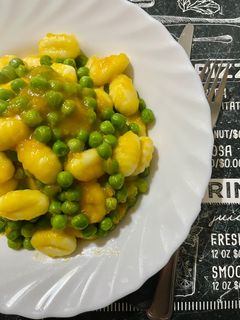 A picture of Gnocchi with Peas and Pumpkin.