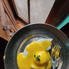 A picture of Poached Egg With The Most Luxurious Hollandaise Sauce.