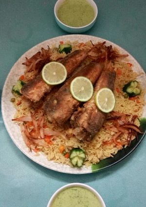 صورة لوصفة سمك (مع الرز المبهر والجزر والبازيلا)