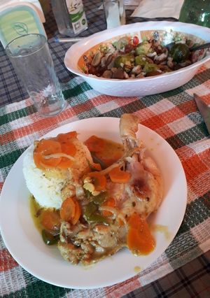 Una foto de Pollo con Arroz