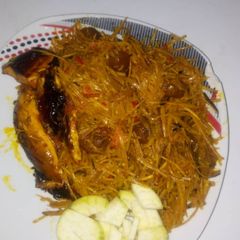 A picture of Delicious Abacha with pomo, smoke fish and garden egg.