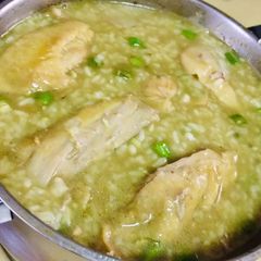 A picture of Turmeric Arroz Caldo - Chicken Congee | Filipino rice porridge.