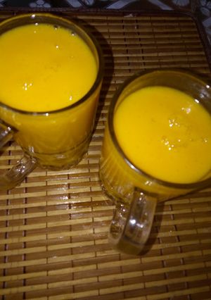 Una foto de Mix de jugo de mango, plátano, leche