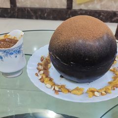 A picture of Chocholate Sphere and Caramel Sauce.