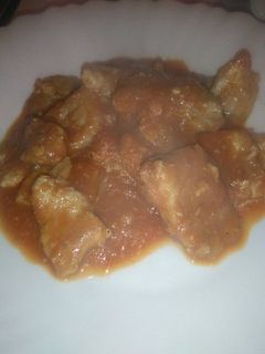 Una foto de Cerdo con tomate