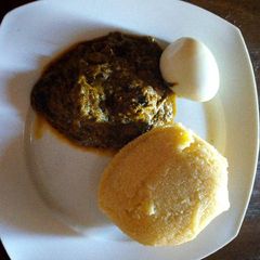 Banga soup with boiled egg and Eba A picture of Banga soup with boiled egg and Eba.