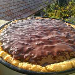 Una foto de 🌴Tarta de coco, dulce de leche y chocolate amargo, Súper fácil
