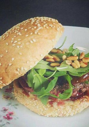 A picture of Feta cheese Burger with Roasted figs.