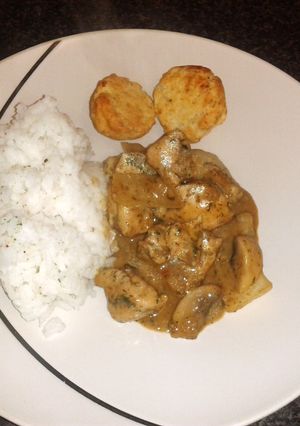 A picture of coconut chicken & mushroom with sweet dumplings & rice.