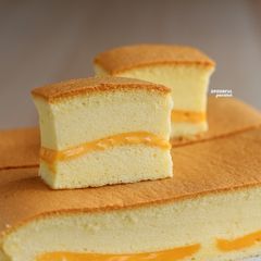 A picture of Ogura Cake with Cheddar Cheese Slices.