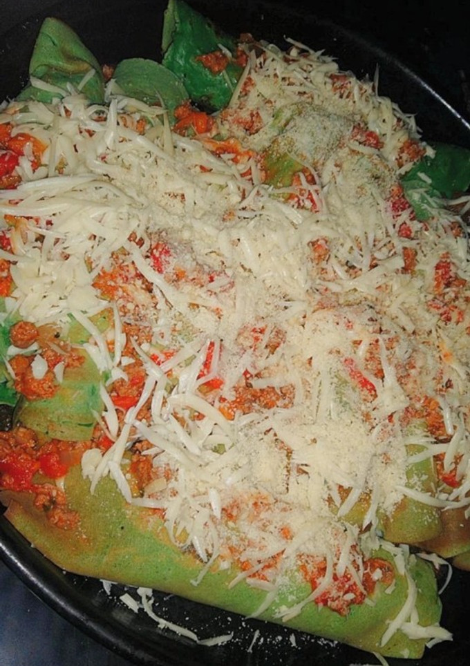 Una foto de Canelones de espinaca 🤯